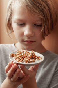 Close-up of girl holding ice cream