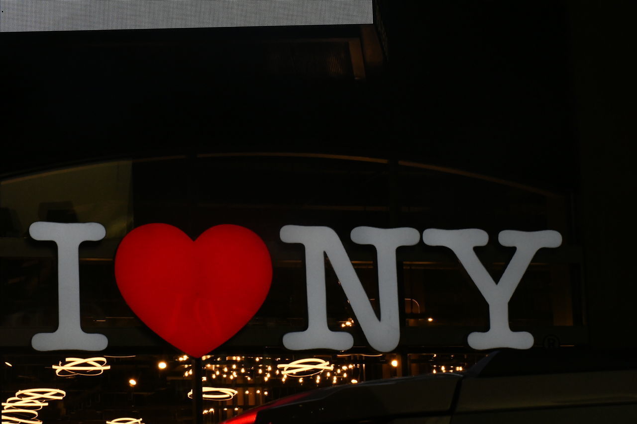 CLOSE-UP OF HEART SHAPE ON GLASS WINDOW