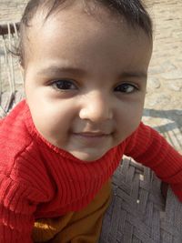 Close-up portrait of smiling girl