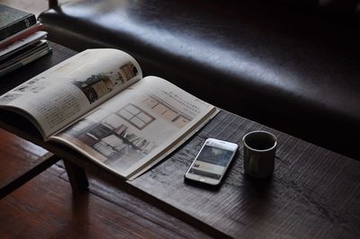 High angle view of coffee cup on table