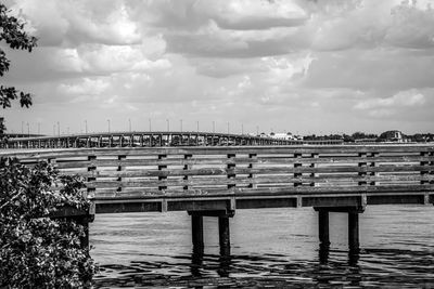 Pier over sea against sky