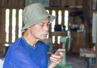 Portrait of man using mobile phone