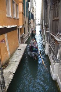 High angle view of boats moored in canal
