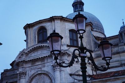 Low angle view of built structure against clear blue sky