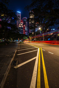 Light trails on city street at night
