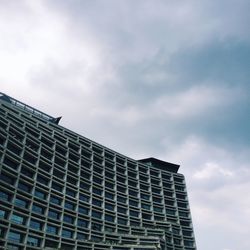 Low angle view of office building against sky