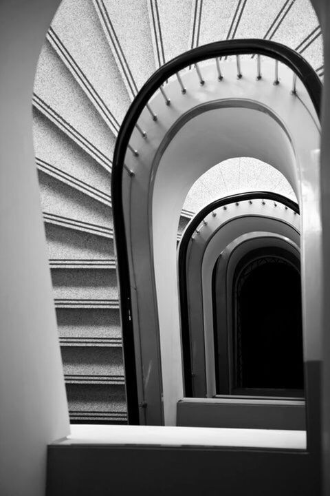 staircase, architecture, steps and staircases, built structure, spiral, spiral staircase, railing, indoors, no people, building, high angle view, day, diminishing perspective, absence, repetition, design, empty, pattern, architectural feature, arch