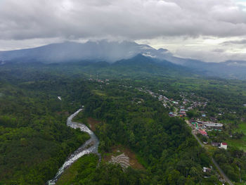 Aerial view of townscape against sky