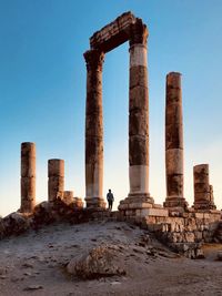 Low angle view of old ruins against clear sky