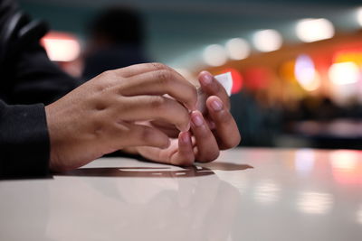 Hand holding laptop