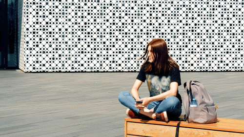 Carefree young woman in city