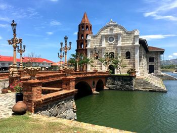 View of temple against cloudy sky