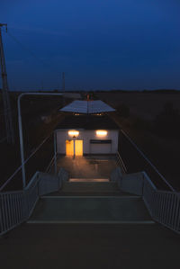 Empty steps at railroad station during night