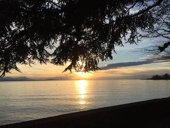 Scenic view of sea against sky at sunset