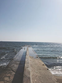 Scenic view of sea against clear sky