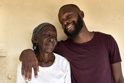 Mozambique, maputo, portrait of grandmother and grandson