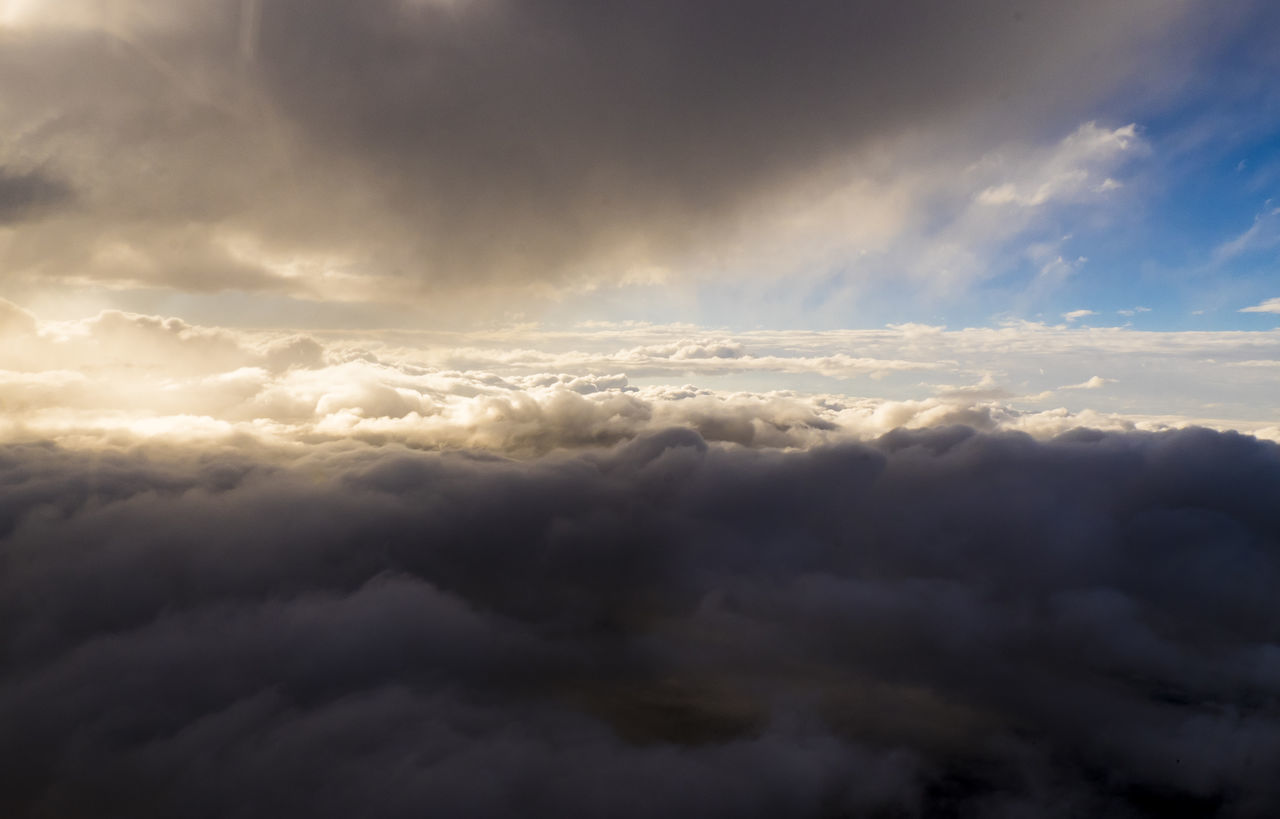 scenics, sky, beauty in nature, cloud - sky, cloudscape, tranquil scene, tranquility, cloudy, nature, weather, sky only, idyllic, cloud, majestic, fluffy, dramatic sky, overcast, atmospheric mood, outdoors, sunset