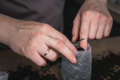 Close-up of person hand holding hands