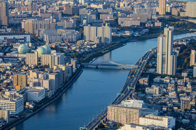 High angle view of bridge over sumida river and buildings in tokyo city