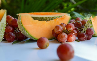 Close-up of fruits in plate on table