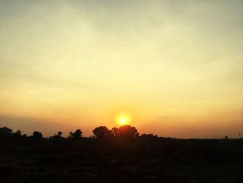 Scenic view of silhouette landscape against sky during sunset