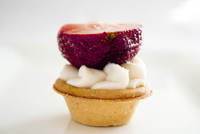 Close-up of dessert against white background