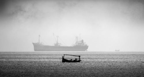 Nautical vessel on sea against sky