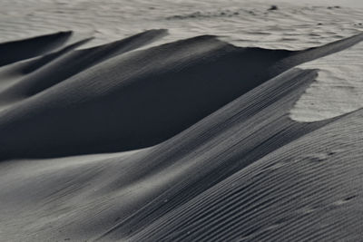 High angle view of sand dune on beach