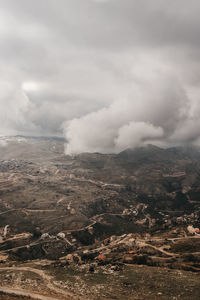 Aerial view of volcanic landscape against sky