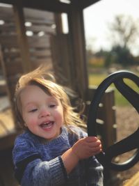 Portrait of cute baby girl at playground 