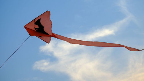 Low angle view of flag against sky