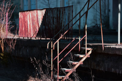 Metal structure against house