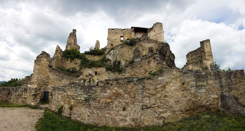 Low angle view of fort against sky