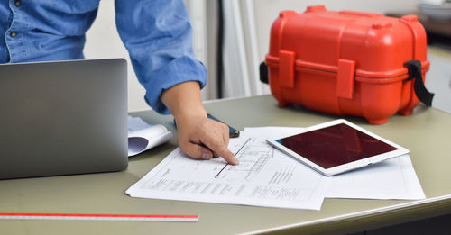 Man using laptop on table