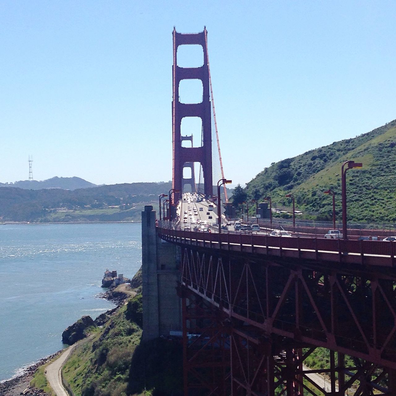 connection, bridge - man made structure, architecture, built structure, engineering, clear sky, transportation, suspension bridge, water, golden gate bridge, mountain, river, bridge, famous place, international landmark, travel destinations, copy space, tourism, travel, blue