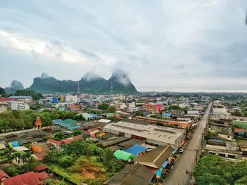 Aerial view of cityscape against sky