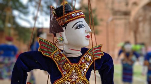 Midsection of person wearing mask