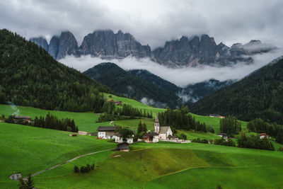 Scenic view of landscape and mountains against sky