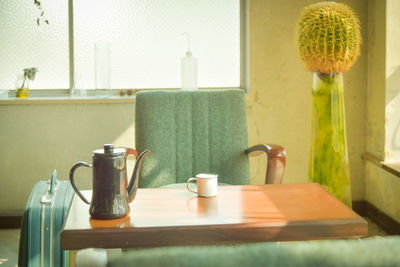 Coffee cup on table at home