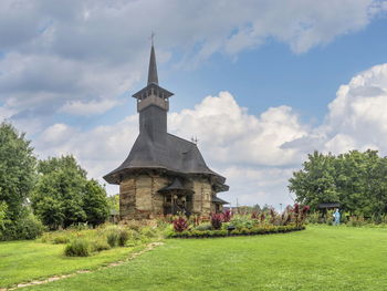 Wooden church of the assumption of the blessed virgin mary in  chisinau, moldova on a summer day.