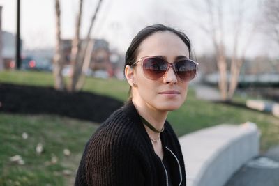Portrait of young woman wearing sunglasses