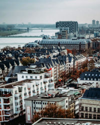 High angle view of buildings against sky in city