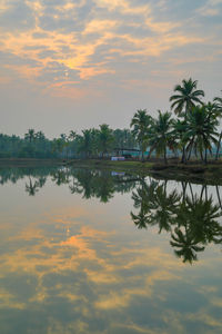 Scenic view of lake against sky during sunset