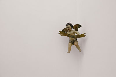 Figurine against white background
