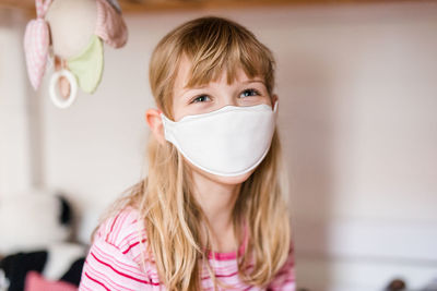 Close-up of girl wearing mask