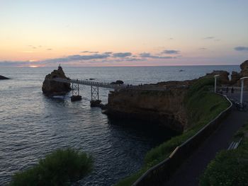 Scenic view of sea at sunset