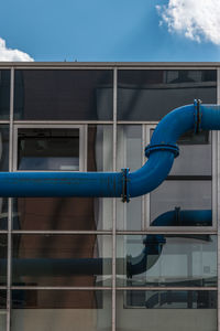 Low angle view of building against blue sky