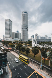 City street and modern buildings against sky
