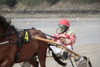 Man riding horse