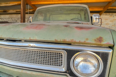 Close-up of abandoned car